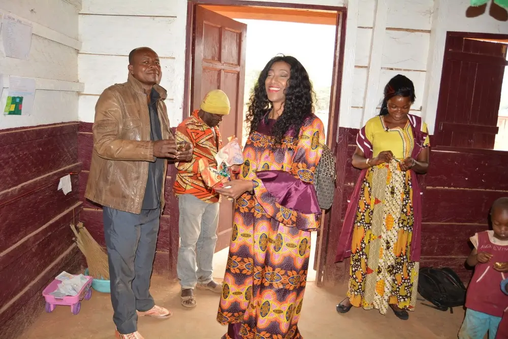 Albertine and Stakeholders at MumzyCRF's first school, The Scrays Of Mang, which opened in September 2019.